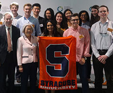 Photo of Chancellor Syverud and Dr. Chen with Syracuse Abroad students in Hong Kong