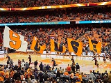 photo of basketball game and Cuse flags