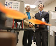 Photo of College of Engineering & Computer Science Professor Utpal Roy, left, and Ph.D. student Yunpeng Li