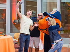 Photo: Family taking a selfie with Otto during Orange Central 2016
