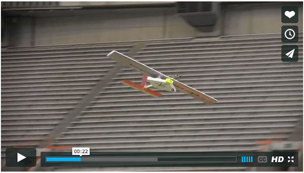 Model plane flying in Carrier Dome