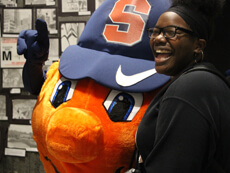 Photo: An alumna smiling with Otto